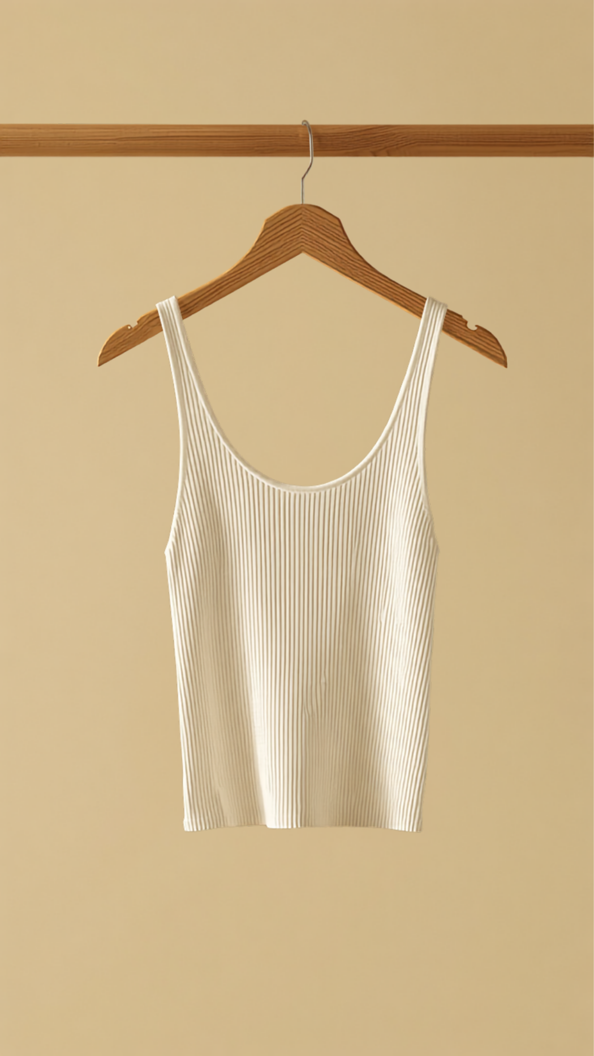 Ribbed white tank top on a wooden hanger